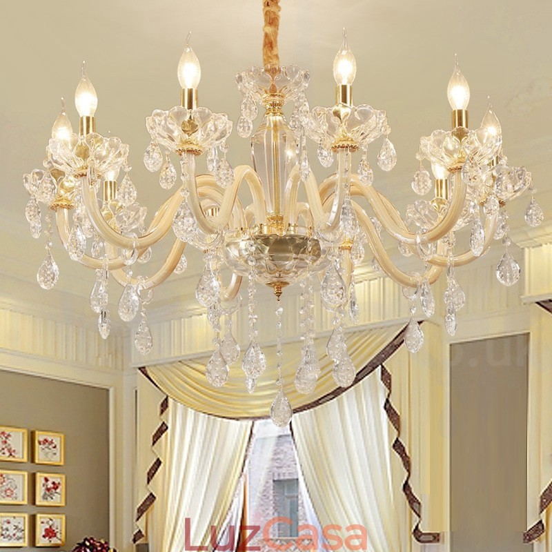 Lustre de ouro com lustre de vela de cristal transparente