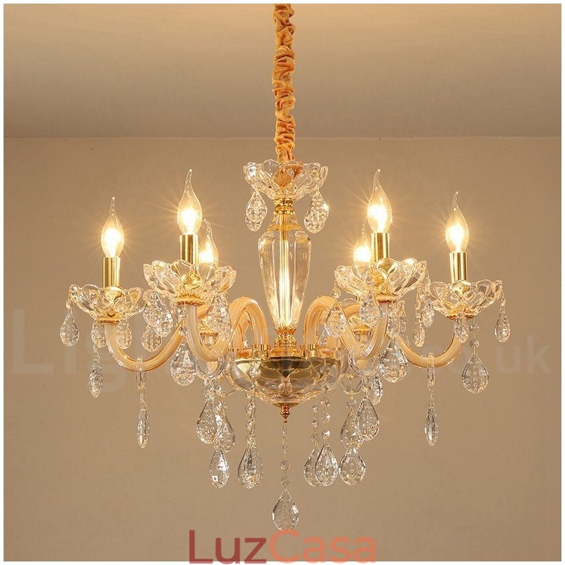 Lustre de ouro com lustre de vela de cristal transparente