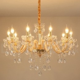 Lustre de ouro com lustre de vela de cristal transparente