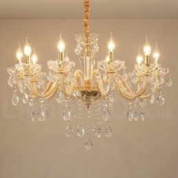 Lustre de ouro com lustre de vela de cristal transparente