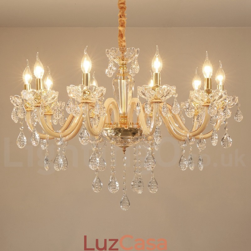Lustre de ouro com lustre de vela de cristal transparente