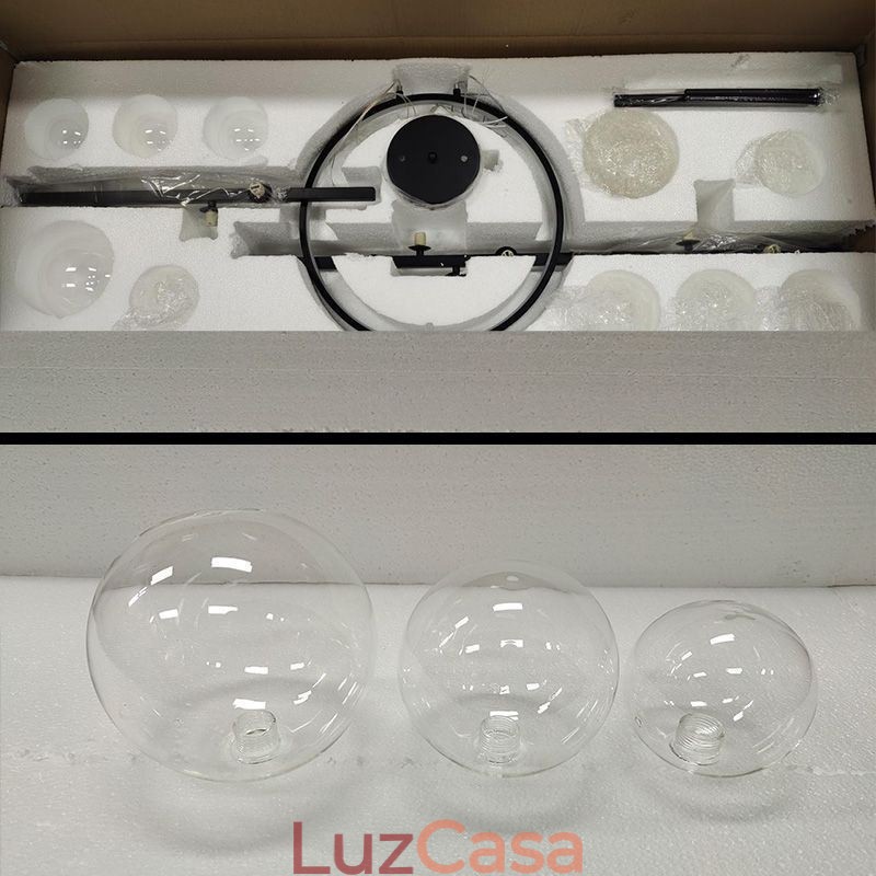 Lustre de metal moderno com bolhas de vidro transparente e lâmpadas pendentes